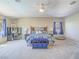 Spacious main bedroom featuring lots of space and a ceiling fan at 2743 Peekskill Ave, Henderson, NV 89052