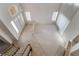 Aerial view of a bright foyer with natural light and elegant staircase at 2894 Carmelo Dr, Henderson, NV 89052