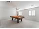 This game room features a billiard table, ceiling fan and great natural light at 2894 Carmelo Dr, Henderson, NV 89052