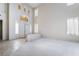 Spacious living room features soaring ceilings, large windows and an abundance of natural light at 2894 Carmelo Dr, Henderson, NV 89052