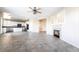 Open living space connects the kitchen and living room with tile floors and natural light at 2894 Carmelo Dr, Henderson, NV 89052