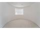 Unique curved room with carpet and natural light creates an inviting space at 2894 Carmelo Dr, Henderson, NV 89052