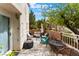 Inviting patio features a seating area, trees, and a well-kept brick fence at 3103 Sunrise Cove Ave, North Las Vegas, NV 89031