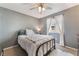 Cozy bedroom with natural light, a comfortable bed, and neutral décor at 3103 Sunrise Cove Ave, North Las Vegas, NV 89031