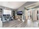 Cozy living room featuring a work area, an open doorway, and a stylish decor at 3103 Sunrise Cove Ave, North Las Vegas, NV 89031