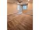 This living room features neutral carpet, neutral walls, and an adjacent hallway at 3481 Bradano Ln, Henderson, NV 89044