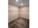 Empty walk-in closet with carpet and metal shelving at 3481 Bradano Ln, Henderson, NV 89044