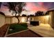 Backyard featuring a lawn, mature tree and a hot tub offering a relaxing outdoor retreat at 3597 Cochise Ln, Las Vegas, NV 89169