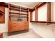 Spacious walk-in closet with custom shelves, hanging rods and drawers for organization at 3597 Cochise Ln, Las Vegas, NV 89169