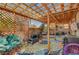 Spacious covered backyard patio with seating and grill, perfect for outdoor living at 3744 Alpine Bypass Ave, North Las Vegas, NV 89081