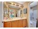 Well-lit bathroom featuring double sinks and a full bathtub at 3744 Alpine Bypass Ave, North Las Vegas, NV 89081