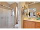 Bathroom featuring enclosed shower, single sink, and access to bedroom at 3744 Alpine Bypass Ave, North Las Vegas, NV 89081