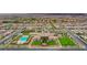 Stunning aerial view of the community with a pool, clubhouse, parks, and well-maintained landscaping at 408 Middlestone Ave, Henderson, NV 89011