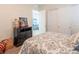 Comfortable bedroom featuring a patterned bedspread and plenty of closet space at 408 Middlestone Ave, Henderson, NV 89011