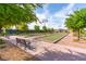 Bocce ball courts with walking paths, benches, and mature landscaping at 408 Middlestone Ave, Henderson, NV 89011