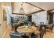 Stylish community dining area featuring modern lighting, cozy seating, and a well-equipped kitchen at 408 Middlestone Ave, Henderson, NV 89011