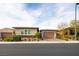 Charming single-story home with well-manicured landscaping and brick paved driveway at 408 Middlestone Ave, Henderson, NV 89011