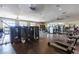 Spacious gym filled with modern fitness equipment, ceiling fans, and mirrored walls for effective workouts at 408 Middlestone Ave, Henderson, NV 89011