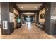 Modern hallway with dark beams, light brick walls, and decorative seating at 408 Middlestone Ave, Henderson, NV 89011