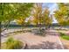 Pickleball courts surrounded by mature trees and landscaping, offering a scenic recreation space at 408 Middlestone Ave, Henderson, NV 89011
