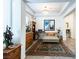 A sitting room with ornate furniture, a chaise lounge, a beautiful rug and plenty of natural light at 408 Middlestone Ave, Henderson, NV 89011