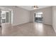 Bedroom features neutral walls, tile floors, ceiling fan, and sliding glass door to the outside at 45 Maleena Mesa St # 1113, Henderson, NV 89074
