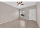 Neutral bedroom featuring a window and spacious closet with double doors, providing comfortable living at 45 Maleena Mesa St # 1113, Henderson, NV 89074