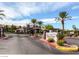 Gated Traverse Point condominiums with palm trees, a manicured entrance, and great landscaping at 45 Maleena Mesa St # 1113, Henderson, NV 89074