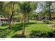 Well-maintained community grounds showcase lush green spaces, mature trees, and inviting walkways at 45 Maleena Mesa St # 1113, Henderson, NV 89074