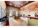 Large community room with tables and chairs, fireplace, and lots of windows at 45 Maleena Mesa St # 1113, Henderson, NV 89074