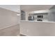 Updated kitchen with stainless steel appliances, gray cabinets, and modern backsplash design at 45 Maleena Mesa St # 1113, Henderson, NV 89074