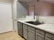 This kitchen features stainless appliances, stone countertops, and a tile backsplash at 45 Maleena Mesa St # 1113, Henderson, NV 89074