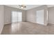 Inviting living area with tile flooring and sliding glass doors, offering access to outdoor spaces at 45 Maleena Mesa St # 1113, Henderson, NV 89074