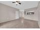 Bright and open living area with neutral walls, tile floors, and ample natural light at 45 Maleena Mesa St # 1113, Henderson, NV 89074