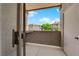 View from the patio highlighting the outdoor space and the building architecture against a bright sky at 45 Maleena Mesa St # 1113, Henderson, NV 89074