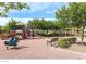 Community playground with slides, swings, and climbing equipment at 45 Maleena Mesa St # 1113, Henderson, NV 89074