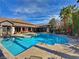 Inviting pool area with lounge chairs, umbrellas, and plenty of space for relaxation and recreation at 45 Maleena Mesa St # 1113, Henderson, NV 89074