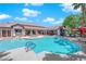 Beautiful community pool and hot tub with seating for residents on a bright, sunny day at 45 Maleena Mesa St # 1113, Henderson, NV 89074