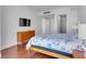 Well-lit bedroom featuring a large television and closet at 4525 Dean Martin Dr # 3006, Las Vegas, NV 89103