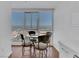 Cozy dining area with a glass table and city views through large windows at 4525 Dean Martin Dr # 3006, Las Vegas, NV 89103