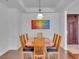 Bright dining room featuring a large table with seating for eight and modern lighting fixtures at 4525 Dean Martin Dr # 3006, Las Vegas, NV 89103