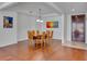 Formal dining room featuring hardwood floors and seating for eight around a rectangular table at 4525 Dean Martin Dr # 3006, Las Vegas, NV 89103