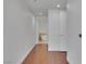 Elegant hallway leading to the bathroom, featuring hardwood floors and modern finishes at 4525 Dean Martin Dr # 3006, Las Vegas, NV 89103