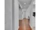 Inviting hallway featuring hardwood floors leading to various rooms of the house at 4525 Dean Martin Dr # 3006, Las Vegas, NV 89103