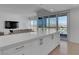 Open floor plan with kitchen breakfast bar and living space at 4525 Dean Martin Dr # 3006, Las Vegas, NV 89103