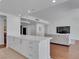 Open concept living and kitchen area, with hardwood floors and a modern design at 4525 Dean Martin Dr # 3006, Las Vegas, NV 89103