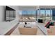 Bright living room showcasing floor-to-ceiling windows with a city view and comfortable seating arrangement at 4525 Dean Martin Dr # 3006, Las Vegas, NV 89103