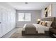 Cozy bedroom featuring neutral décor, a large window, and a spacious closet at 5032 S Rainbow Blvd # 206, Las Vegas, NV 89118