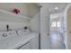 Convenient laundry room featuring washer and dryer hookups and ample storage at 5032 S Rainbow Blvd # 206, Las Vegas, NV 89118