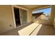 Spacious balcony with sliding glass door and a beige facade at 5615 Oak Bend Dr, Las Vegas, NV 89135